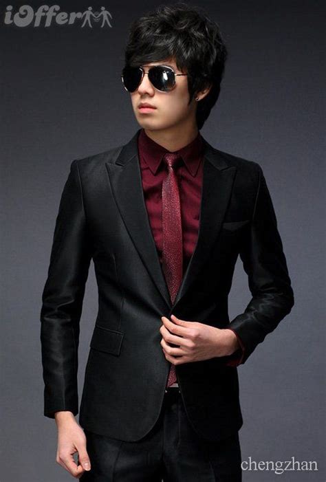 black suit maroon tie.